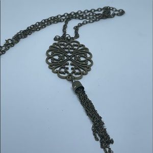 Long brass statement pendant